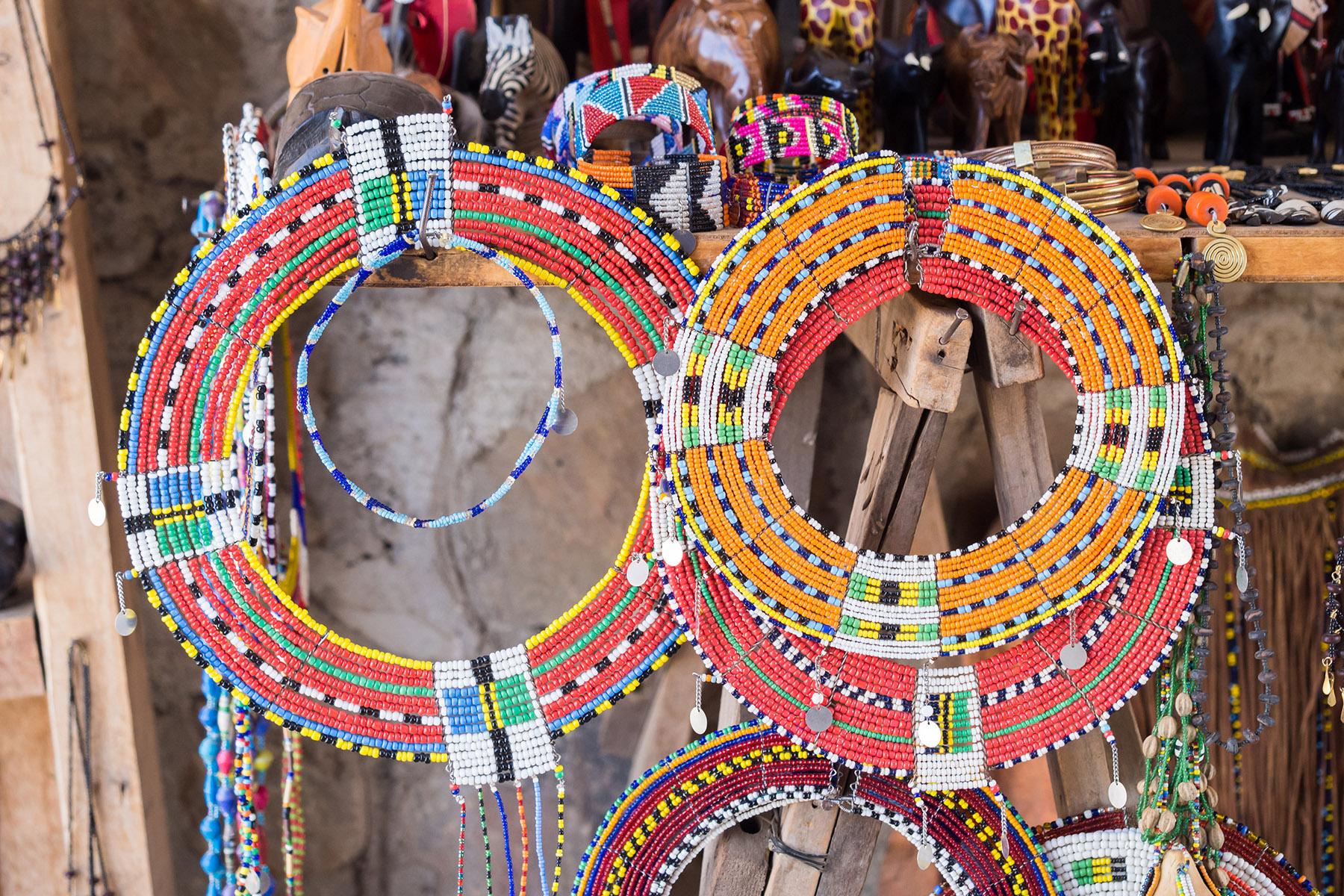 Colorful Maasai bead necklaces and other jewelry sold as a souvenirs at a local Maasai Market.